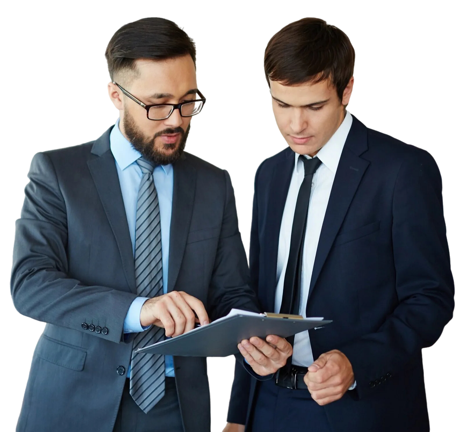Two businessmen in suits review documents together during a meeting, illustrating skills development.