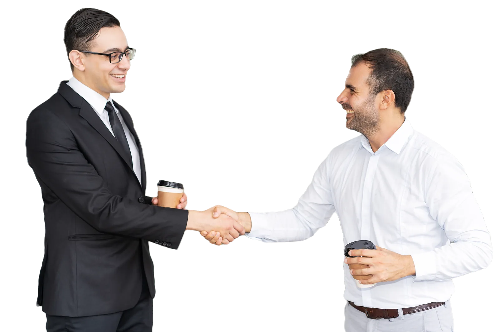Two businessmen shake hands while holding coffee cups, demonstrating successful llnd training partnerships.
