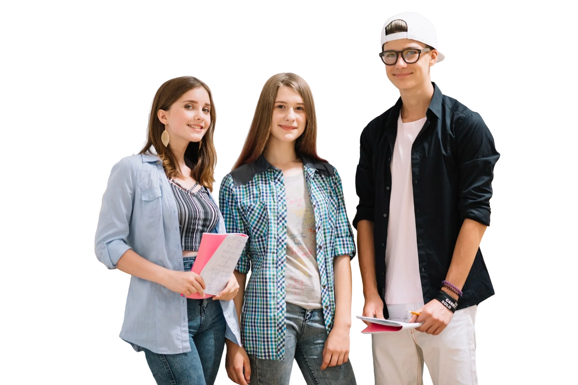 Three students stand together holding books and notebooks during a CAQA LLND course.