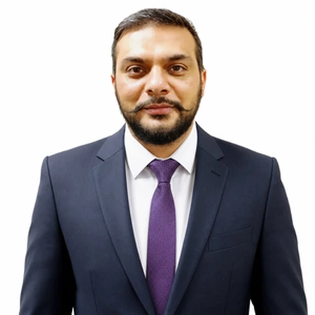 Aman Plaha is a professional headshot showing a man in a suit and tie.