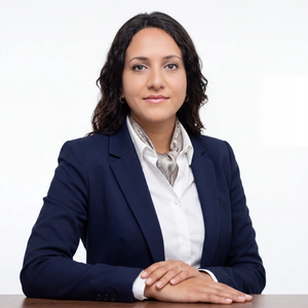 A professional headshot of Harneet Randhawa, a member of the CAQA LLND team.