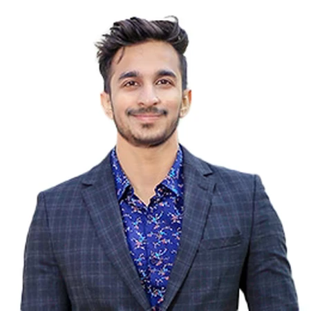 Patrick Satapara (Pratik) smiles for a portrait as part of the CAQA LLND team.