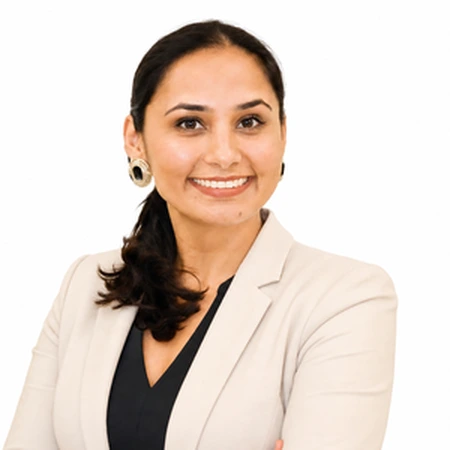 A professional headshot of Raj Kiran Kaur, a member of the CAQA LLND team.